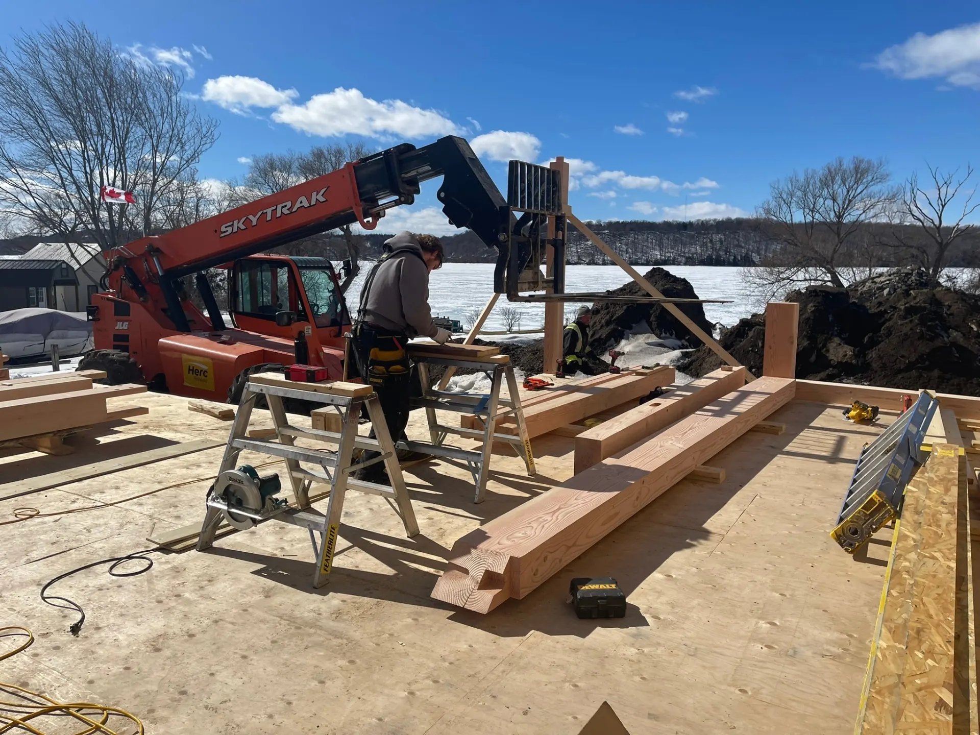 Lakeside Construction Management crew framing a custom cottage in Ontario